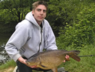 Man holding a 15lb 2oz common carp
